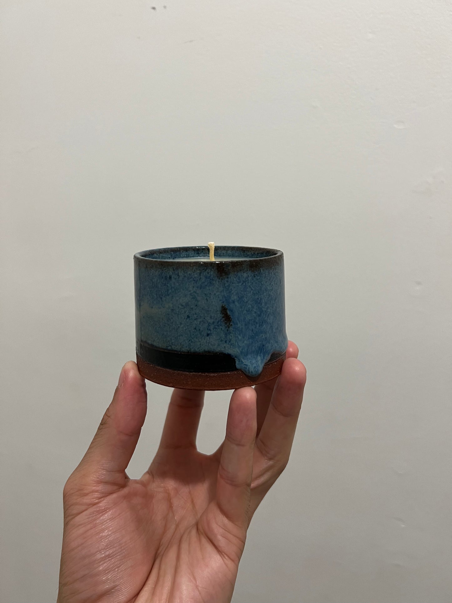 Candle - blue glaze on red clay