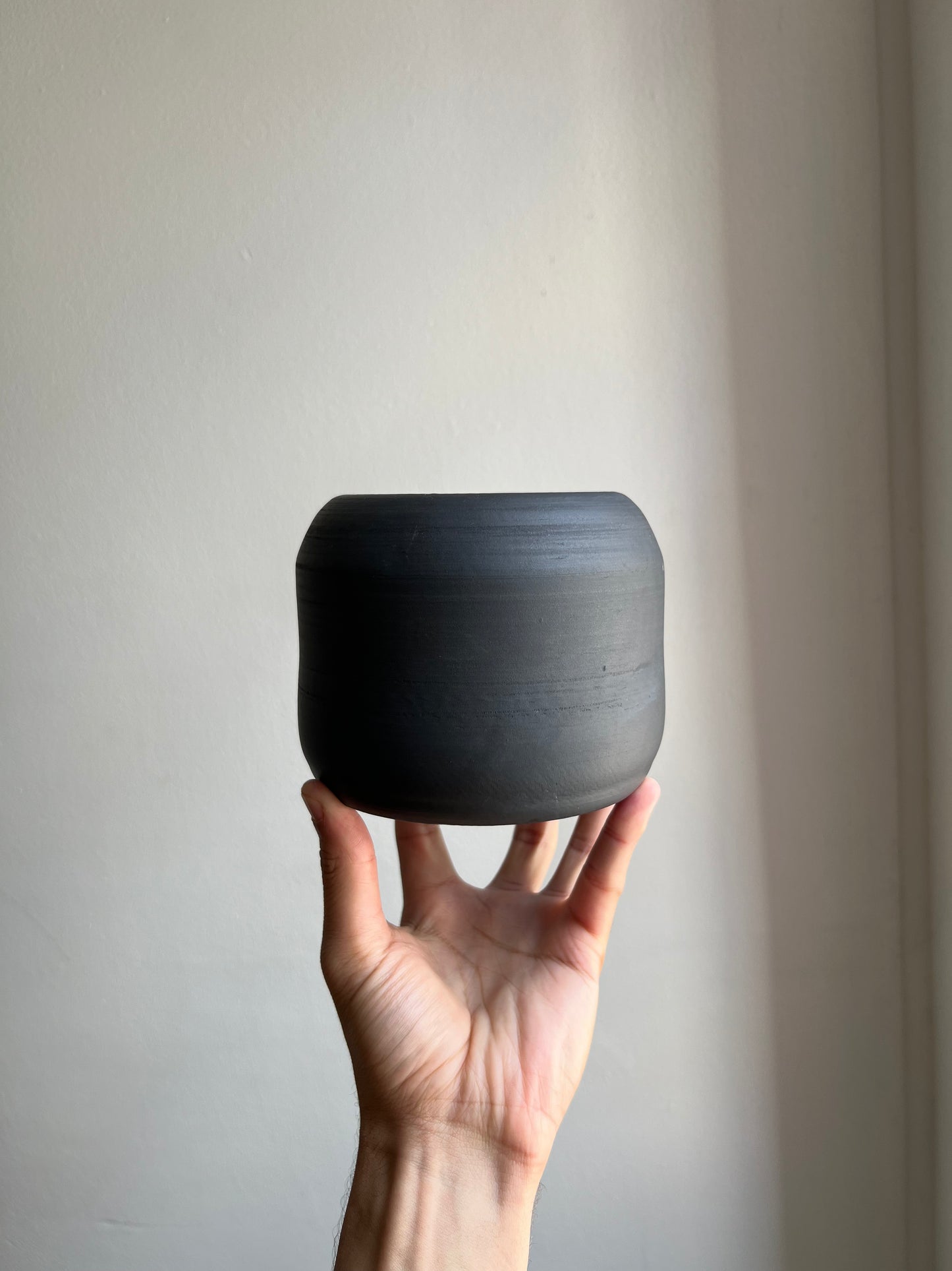 unglazed signature planter two